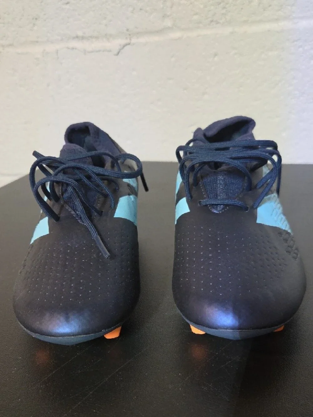 New Balance Men’s Navy Soccer Cleats with Light Blue Logo and Orange Studs